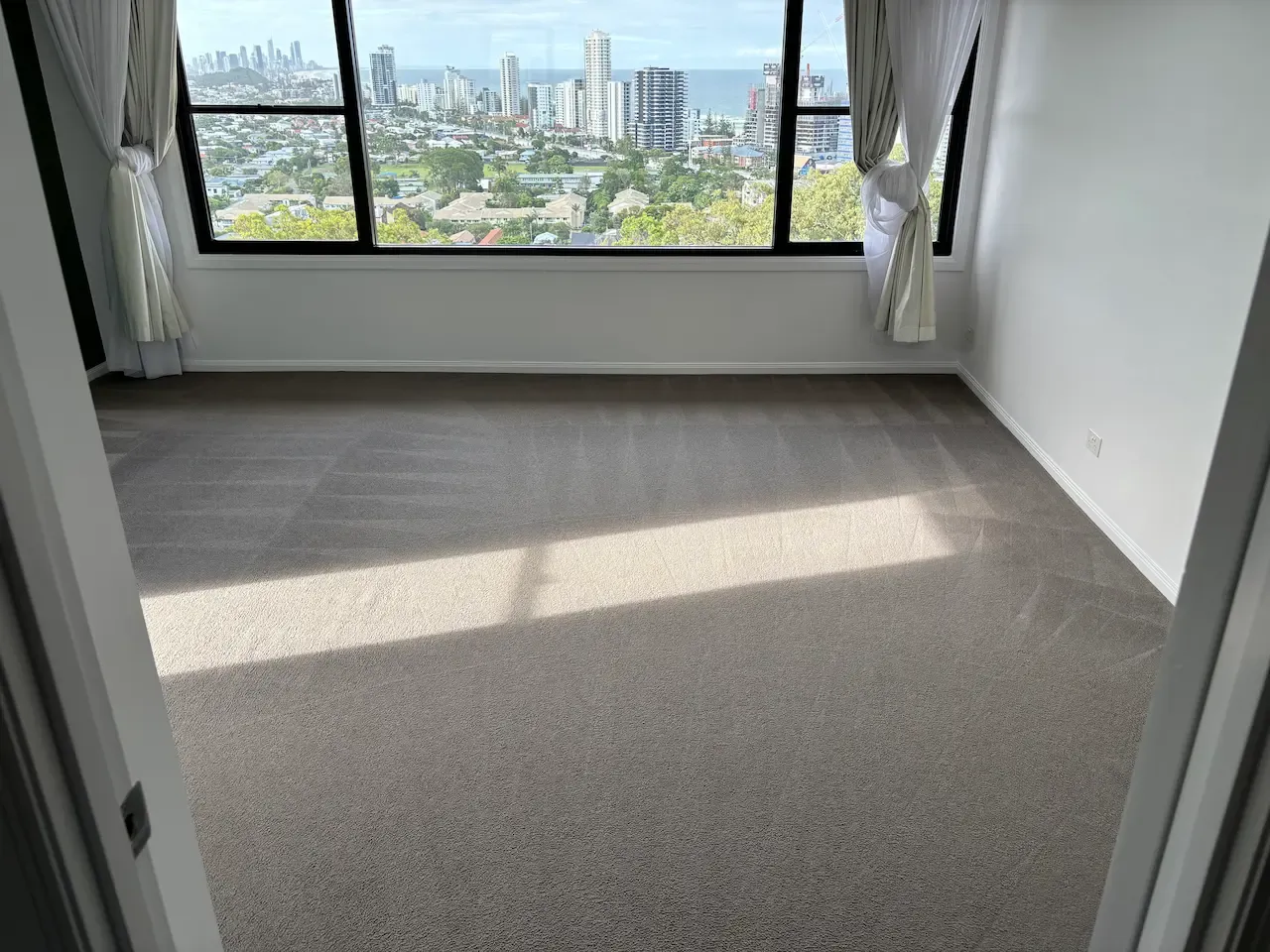 Pristine, freshly cleaned carpets in a modern Gold Coast residence