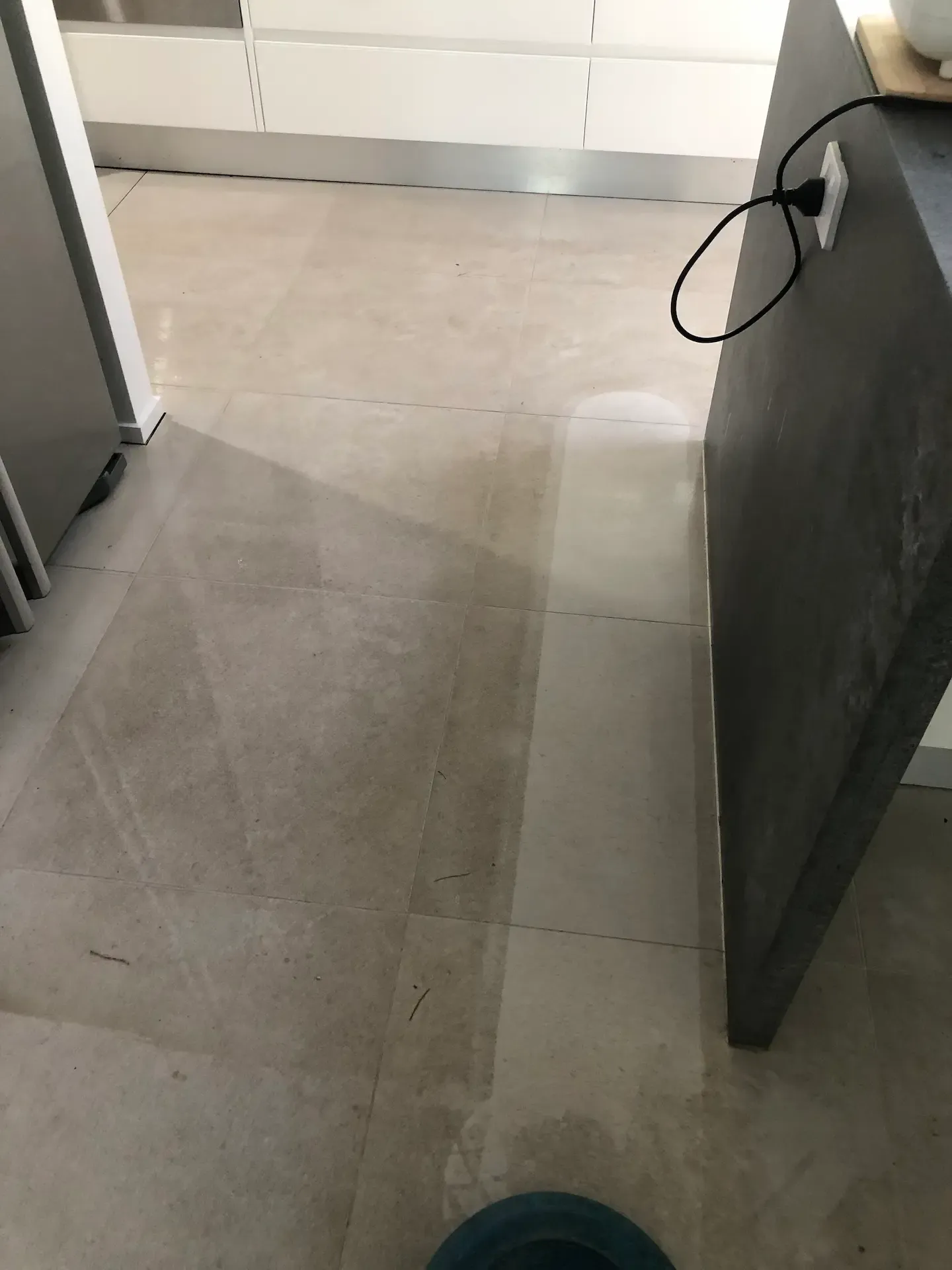 Professional kitchen tile and grout cleaning Gold Coast service being performed in a Gold Coast home